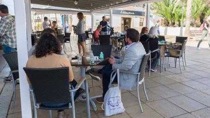 FORMENTERA, SPAIN - MAY 04: Customers at Centro coffee shop are seen as phase 1 of the reduction of confinement starts on May 04, 2020 in Formentera, Spain. (Photo by Europa Press News/Europa Press via Getty Images)