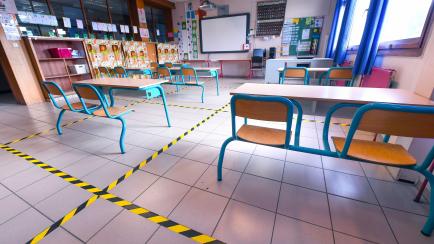JODOIGNE, BELGIUM - MAY 11 : The schools are preparing for the reopening with respect to sanitary measures and social distancing: 4m2 per child and 8m2 for the teacher. The teachers are educating the children about the new health measures. Illus...
