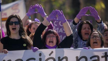 SEVILLA, SPAIN - MARCH 08: Some women form the feminist symbol with their hands during the demonstration on the International Women's Day in Sevilla on March 08, 2020 in Sevilla, Spain. (Photo by María José López/Europa Press via Getty Images...