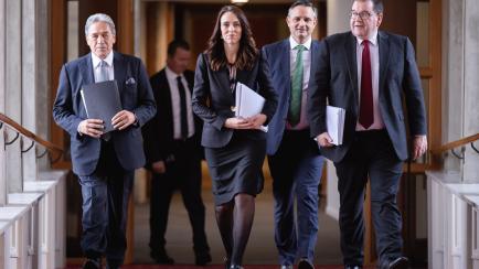 WELLINGTON, NEW ZEALAND - MAY 14: (L-R) Deputy Prime Minister Winston Peters, Prime Minister Jacinda Ardern, Greens leader James Shaw and Finance Minister Grant Robertson walk to the house during Budget 2020 delivery day at Parliament on May 14,...