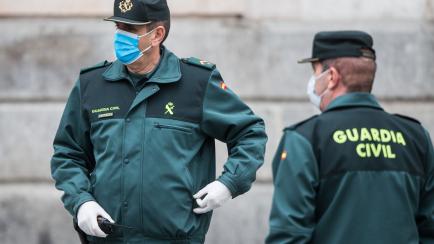 MADRID, SPAIN - APRIL 21: Guardia Civil officers are seen at Puerta del Sol in Madrid where a minute of silence has been held for the dead from coronavirus in Madrid on April 21, 2020 in Madrid, Spain. (Photo by Joaquín Corchero/ Europa Press v...