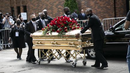 MINNEAPOLIS, USA - JUNE 04: George Floyd's casket is wheeled to a hearse after the first of three memorial services for him on June 4, 2020 at Trask Worship Center at North Central University in Minneapolis, Minnesota, United States. Hundreds of...