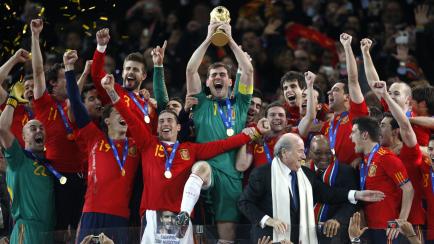 Spain captain and goalkeeper Iker Casillas lifts the world cup trophy and celebrates with teammates   (Photo by Mike Egerton - PA Images via Getty Images)