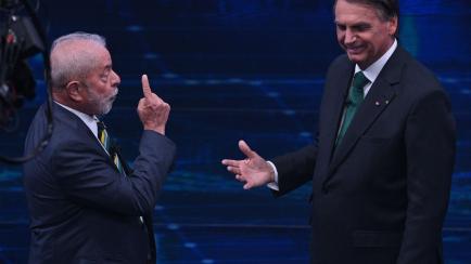 Lula da Silva (izquierda) y Jair Bolsonaro durante el debate televisado