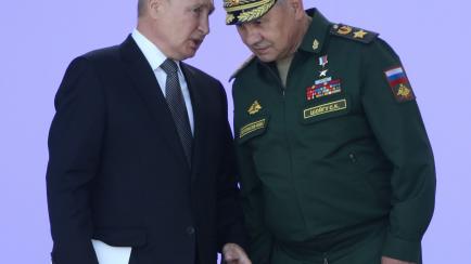 El presidente ruso, Vladimir Putin, y el ministro de Defensa, Sergei Shoigu.
