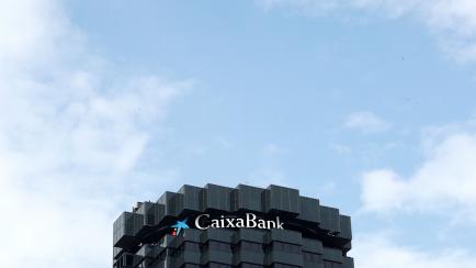 CaixaBank's logo is seen on top of the company's headquarters in Barcelona, Spain, September 17, 2020. REUTERS/Albert Gea