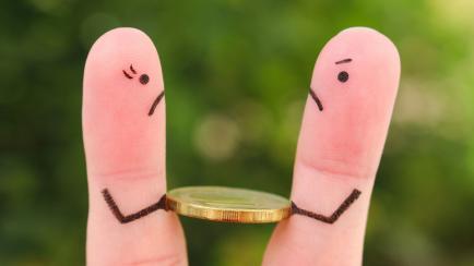 Fingers art of family during quarrel. Concept of man and woman cannot divide money after divorce.