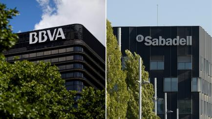 (COMBO) This combination of file pictures created on November 16, 2020 shows the logo of Spanish bank BBVA in a building in Madrid and the logo of Sabadell Bank in a building in Sant Cugat de Valles on October 5, 2017. - Spain's second-largest b...
