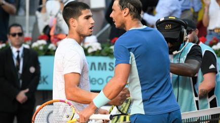 MADRID, SPAIN - MAY 06: Carlos Alcaraz greats Rafael Nadal during their match at the Mutua Madrid Open, on May 6, 2022, in Madrid, Spain. (Photo By Jose Oliva/Europa Press via Getty Images)
