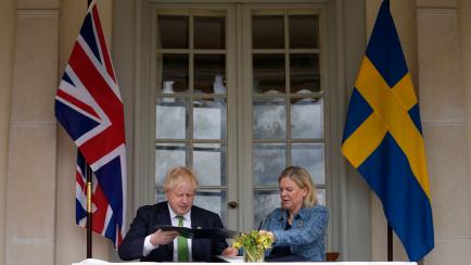 Boris Johnson y Magdalena Andersson.