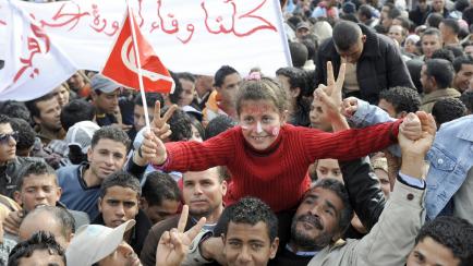 Poeple gather on December 17, 2011  in Sidi Bouzid's Mohamed Bouazizi square, named after the fruitseller whose self-immolation sparked the revolution that ousted a dictator and ignited the Arab Spring. Thousands of Tunisians rallied in celebrat...