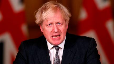 Britain's Prime Minister Boris Johnson speaks during a virtual press conference inside 10 Downing Street in central London on December 30, 2020, to give an update on the coronavirus covid-19 pandemic. - Britain has become the first country in th...