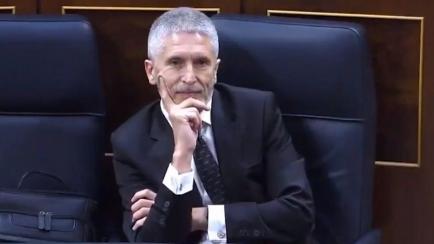 Fernando Grande-Marlaska durante la intervención de Íñigo Errejón.