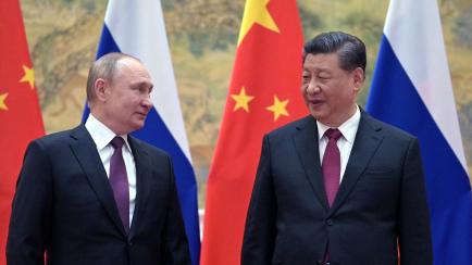 Vladimir Putin y Xi Jinping posan juntos en su última reunión, el 4 de febrero pasado, en Pekín. 