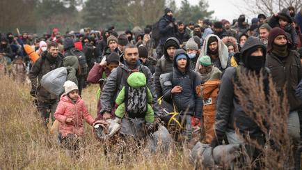 Migrantes atrapados en la frontera entre Polonia y Bielorrusia.