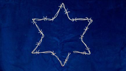 Una estrella de seis puntas, en el acto de recuerdo a las víctimas del Holocausto celebrado el 26 de enero en Madrid. 