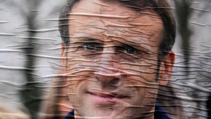 Cartel de Emmanuel Macron, presidente de Francia y candidato a la reelección.