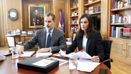 MADRID, SPAIN - MARCH 27: In this handout photo provided by Casa de S.M. el Rey Spanish Royal Household, King Felipe of Spain and Queen Letizia of Spain take part in a video conference with the Spanish Committee of Representatives Of People with...
