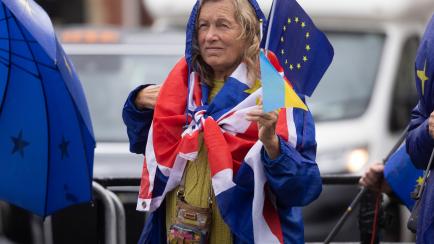 LONDON, ENGLAND - MAY 11: Pro Europe Brexit protesters in Parliament Square on May 11, 2022 in London, England. British Prime Minister Boris Johnson has renewed warnings that he would be prepared to override parts of the Northern Ireland Protoco...