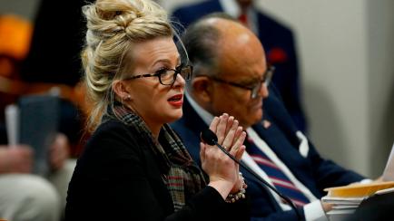 Melissa Carone, who was working for Dominion Voting Services, speaks in front of the Michigan House Oversight Committee in Lansing, Michigan on December 2, 2020. - The president's attorneys, led by Rudy Giuliani, have made numerous allegations o...