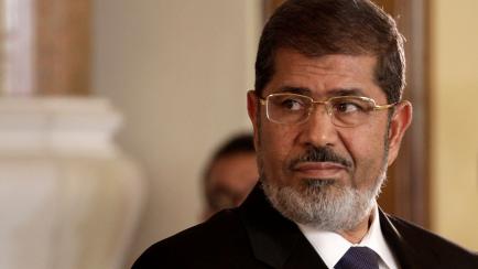 FILE - In this July 13, 2012 photo, Egyptian President Mohammed Morsi holds a news conference with Tunisian President Moncef Marzouki, at the Presidential palace in Cairo, Egypt. On Monday, June 17, 2019, Egypt's state TV said that the count...