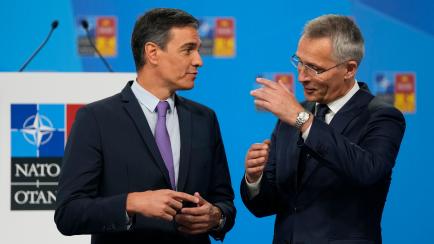 NATO Secretary General Jens Stoltenberg, right, talks with Spanish Prime Minister Pedro Sanchez at the NATO summit venue in Madrid, Spain on Tuesday, June 28, 2022. North Atlantic Treaty Organization heads of state will meet for a NATO summit in...