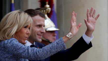 French President Emmanuel Macron and his wife Brigitte Macron accompany Romanian President Klaus Iohannis and his wife Carmen Iohannis (not seen) as they leave after a meeting at the Elysee Palace in Paris, France, November 27, 2018.   REUTERS/P...