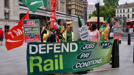 LONDON, UNITED KINGDOM - AUGUST 20: Rail, Maritime, and Transport (RMT) union workers hold a picket outside London Victoria rail station amid a strike over pay and conditions in London, United Kingdom on August 20, 2022. London Victoria rail sta...