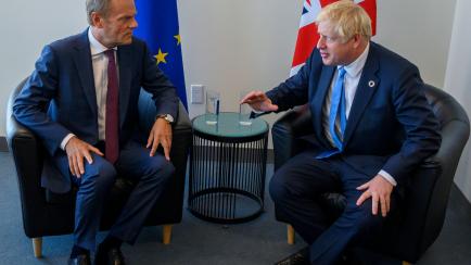 Donald Tusk, left, President of the European Council, and Boris Johnson, British Prime Minister, meet at the United Nations, Monday, Sept. 23, 2019, in New York. (Don Emmert/Pool Photo via AP)