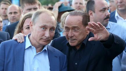 YALTA, CRIMEA- SEPTEMBER 11: Russian President Vladimir Putin (L) and Former Italain Prime Minister Silvio Berlusconi (R) are seen during a joint walkabout on the streets on September 11, 2015 in Yalta, Crimea,  Russian President Vladimir Putin ...