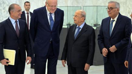 BEIRUT, LEBANON - OCTOBER 11: Lebanese President Michel Aoun (2nd R) meets with Lebanese Prime Minister Najib Mikatiâ (2nd L) after the maritime border agreement between Lebanon and Israel was signed in Beirut, Lebanon on October 11, 2022. Depu...