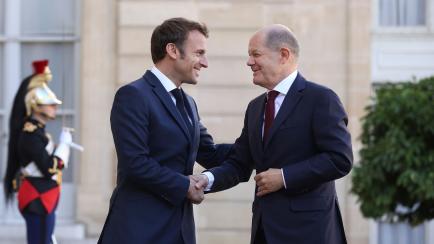 PARIS, FRANCE - OCTOBER 26: In this handout image provided by German Government Press Office (BPA), French President Emmanuel Macron Hosts German Chancellor Olaf Scholz at the Elysée Palace on October 26, 2022 in Paris, France. (Photo by Ronny ...