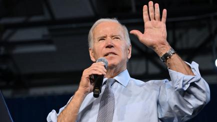 US President Joe Biden speaks during a rally for gubernatorial candidate Wes Moore and the Democratic Party on the eve of the US midterm elections, at Bowie State University in Bowie, Maryland, on November 7, 2022. (Photo by Mandel NGAN / AFP) (...