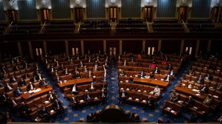 UNITED STATES - JANUARY 7 (FILE): Members of the House and Senate attend a joint session of Congress to certify the Electoral College votes of the 2020 presidential election in the House chamber on Thursday, January 7, 2021. Rioters attacked the...