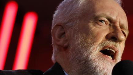 Britain's opposition Labour party leader Jeremy Corbyn  addresses a general election campaign rally in Birmingham, central England on December 5, 2019. - Britain will go to the polls on December 12, 2019 to vote in a pre-Christmas general electi...