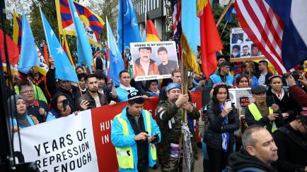 BRUSSELS, BELGIUM - OCTOBER 1 :  People gather to protest against China's Uyghur policy in Brussels, Belgium on October 1, 2019. (Photo by Dursun Aydemir/Anadolu Agency via Getty Images)