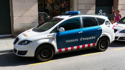 Barcelona, Spain - 2019 : Mossos d'Esquadra, autonomous police force of Catalonia, patrol vehicle parked on the city street