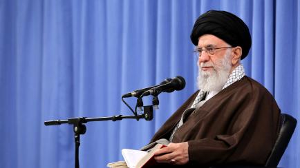 In this picture released by an official website of the office of the Iranian supreme leader, Supreme Leader Ayatollah Ali Khamenei talks to clerics during his Islamic thoughts class in Tehran, Iran, Sunday, Nov. 17, 2019. Iran's supreme leader o...