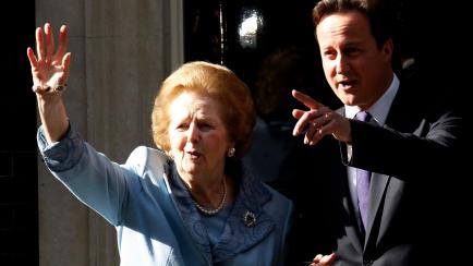 Britain's Prime Minister David Cameron (R) escorts former Prime Minister Margaret Thatcher after their meeting at 10 Downing Street in London June 8, 2010.  REUTERS/Suzanne Plunkett (BRITAIN - Tags: POLITICS PROFILE)