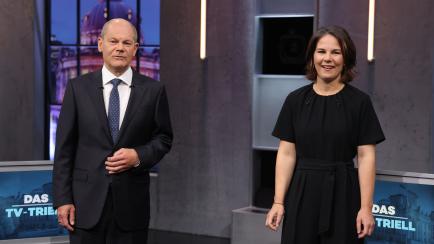 BERLIN, GERMANY - SEPTEMBER 19: Chancellor candidates Olaf Scholz of the German Social Democrats (SPD) and Annalena Baerbock of the Greens Party, as well as Armin Laschet of the Christian Democrats (CDU/CSU) (not pictured) arrive for the final "...