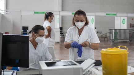 IBIZA, SPAIN - SEPTEMBER 15: Nurses prepare the material for vaccines against Covid-19 on September 15, 2021 in Ibiza, Spain. Last week, Spain's health regulator approved the use of third Covid-19 vaccination shots for immunocompromised people, ...