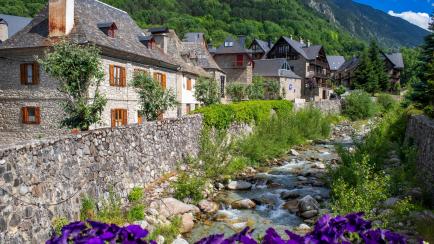 Arties village Viella, Val d'Aran, Aran Valley in Aran Valley in Pyrenees Lleida Catalonia Spain. The town of Arties of 524 inhabitants is located at an altitude of 1,143m at the confluence of the Valarties River with the Garonne River, in a sma...