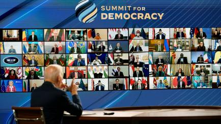 President Joe Biden speaks from the South Court Auditorium on the White House complex in Washington, Thursday, Dec. 9, 2021, for the opening of the Democracy Summit.The two-day virtual summit is billed as an opportunity for leaders and civil soc...