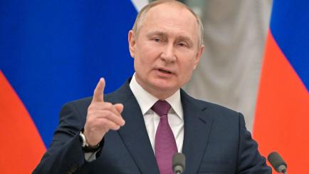 Russian President Vladimir Putin speaks during a joint press conference with German Chancellor following their meeting over Ukraine security at the Kremlin, in Moscow, on February 15, 2022. - The Kremlin, earlier on February 15, 2022, confirmed ...