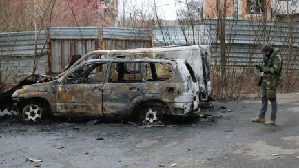 DONETSK, UKRAINE - FEBRUARY 28: Destroyed vehicles are seen in Donetsk's Kievsky Rayonda, which is under control of pro-Russian separatists, as Russian attacks continue in Ukraine on February 28, 2022. (Photo by Leon Klein/Anadolu Agency via Get...