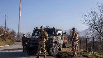 ZVECAN, KOSOVO - DECEMBER 26: Nato led soldiers of Italian army in the village of Rudare on December 26, 2022 near Zvecan, Kosovo. According to officials, shots were fired in an area in northern Kosovo as NATO troops were patrolling on Sunday, a...