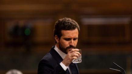 MADRID, SPAIN - JUNE 03: Spanish conservative People's Party (PP) leader Pablo Casado is seen drinking water during the plenary session at the parliament to debate on an extension of the state of emergency amid the coronavirus outbreak on June 0...