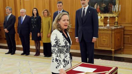 Spain's Deputy Prime Minister for economic affairs Nadia Calvino takes the oath of office next to Spain's King Felipe VI during a ceremony at Zarzuela Palace in Madrid, Spain, January 13, 2020. Chema Moya/Pool via REUTERS