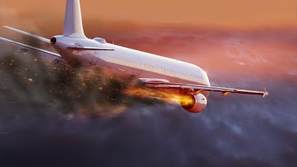 Recreación de un avión con los motores en llamas.