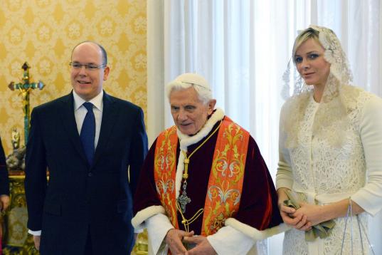 Pope Benedict XVI welcomes Prince Albert II of Monaco and his wife Princess Charlene on January 12, 2013 prior to a private audience at Vatican.    AFP PHOTO / VINCENZO PINTO        (Photo credit should read VINCENZO PINTO/AFP/Getty Images)